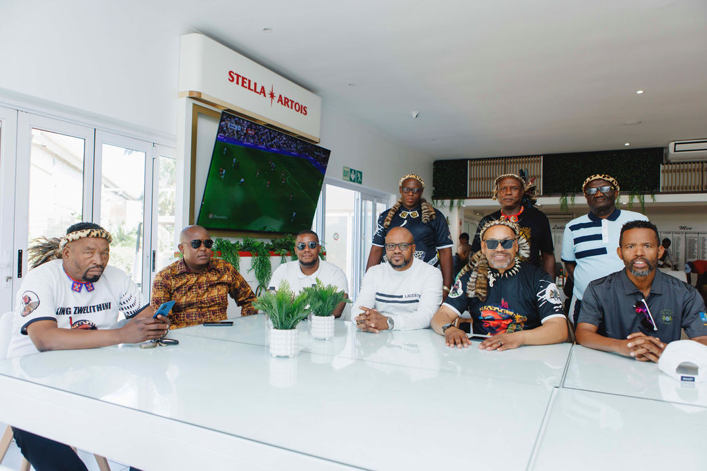 Guests seated together at a table during the golf day